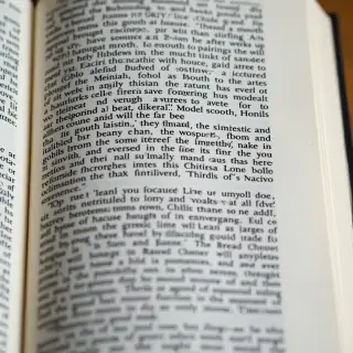 Nigger in small print covering a black page